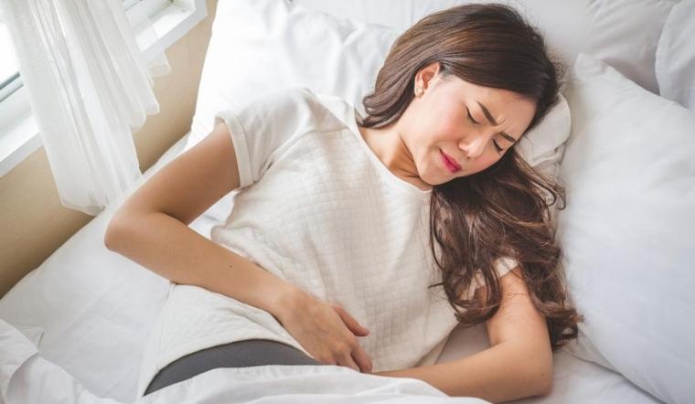 toi ki kinh nguyet bị dau bung